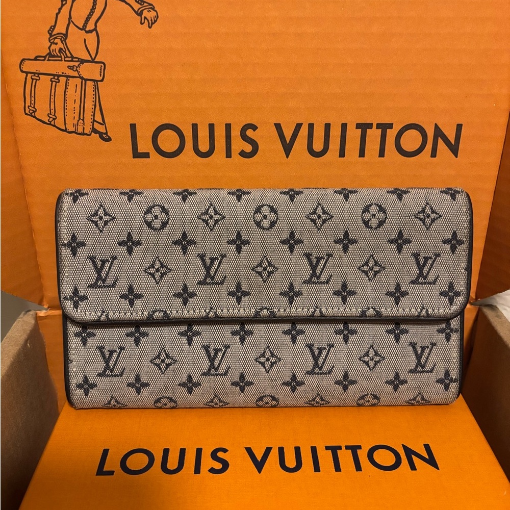 Louis Vuitton Monogram Mini Lin Porte Tresor International wallet